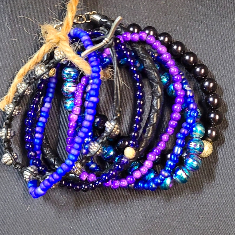 Homemade stretchy bracelet lot. Leather, Black, purples, blues. Only one like it